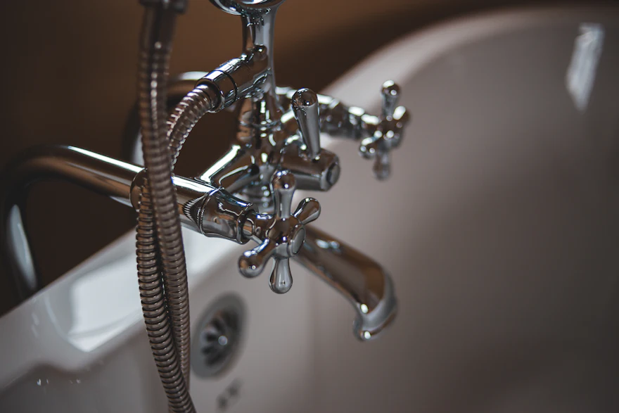 Restored clawfoot tub with new chrome fixture set